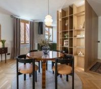 Dining table with wood shelving divider